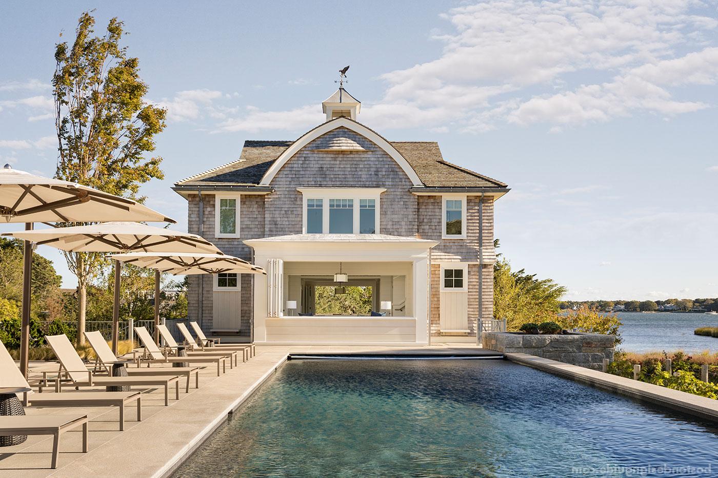 Classic Cape Cod poolhouse with cupola designed by Catalano Architects and constructed by KVC Builders