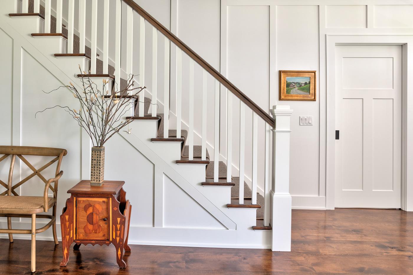 Staircase with custom wainscoting, Laplante Construction