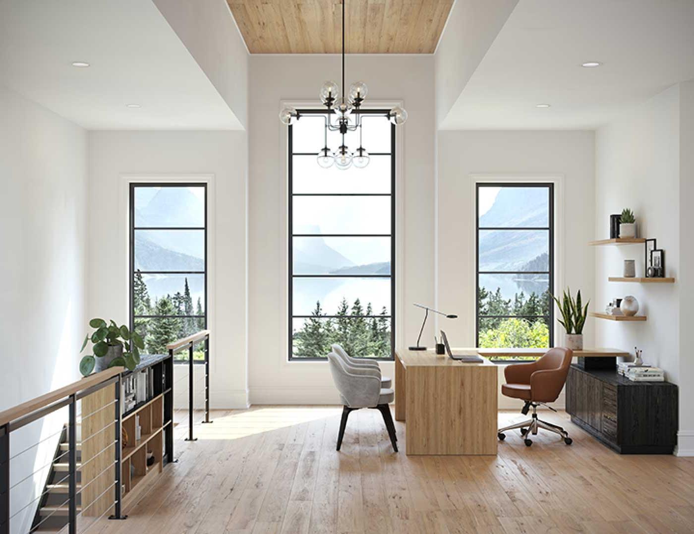 office with floor to ceiling windows overlooking mountains and water
