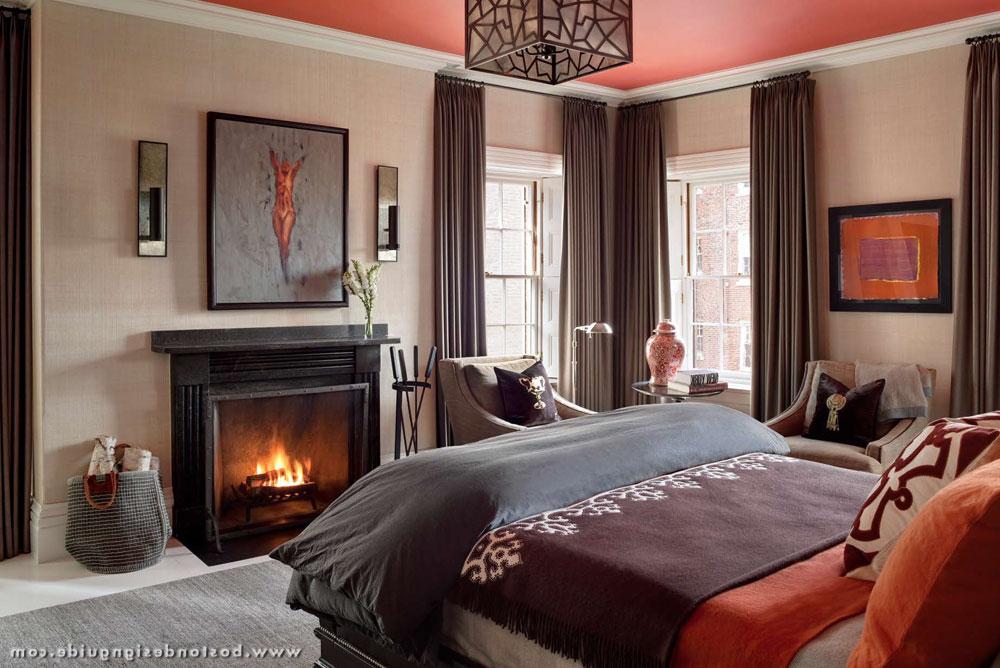 Fireside master bedroom with warm colors